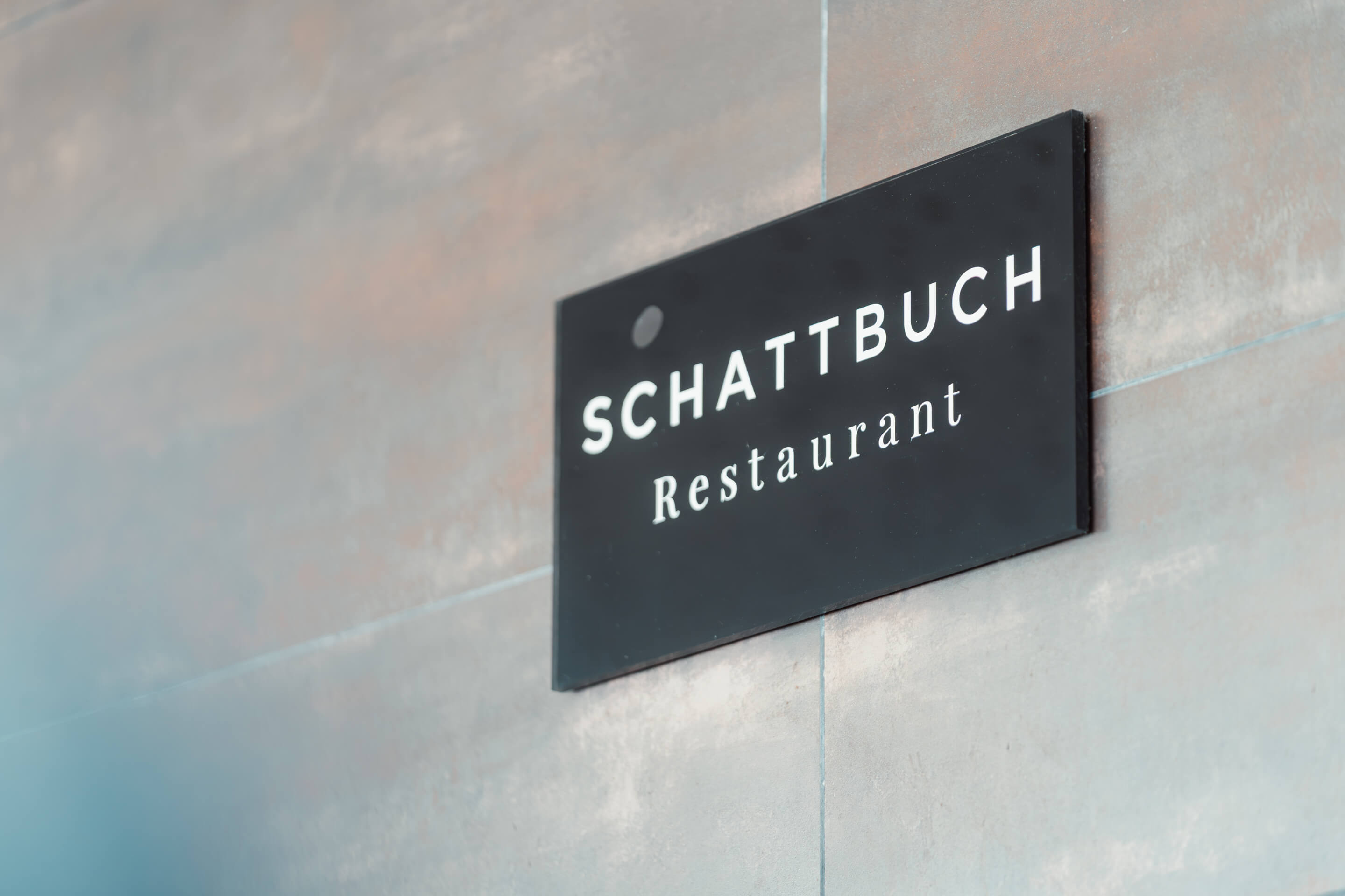 Schattbuch Restaurant Metallsiegel